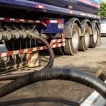 TLILIC0001 Licence to Transport Dangerous Goods by Road training — truck with dangerous goods placarded load.